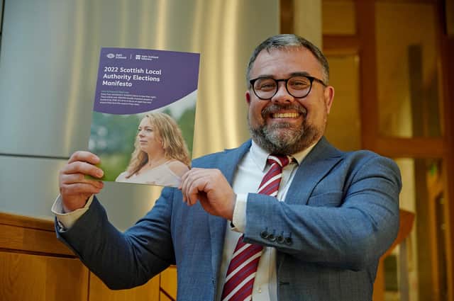 Craig Spalding, Chief Executive of Sight Scotland and Sight Scotland Veterans, with the Local Authority Elections Manifesto