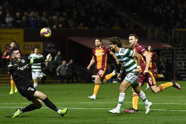 Celtic's Jota scores against Motherwell but the effort was ruled out for offside by VAR. (Photo by Rob Casey / SNS Group)