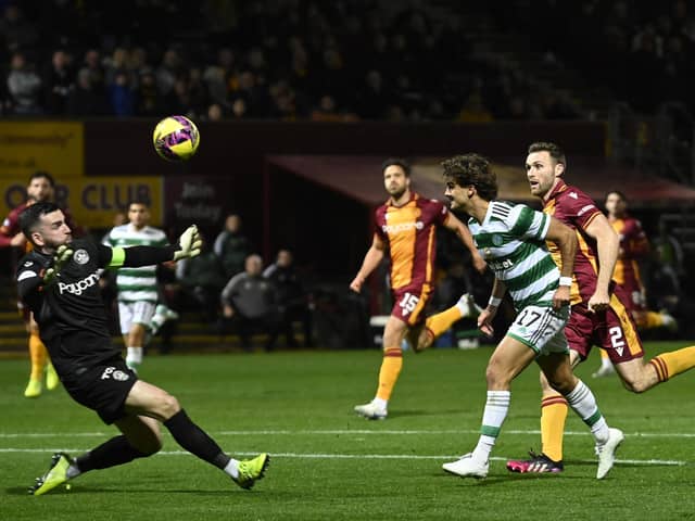 Celtic's Jota scores against Motherwell but the effort was ruled out for offside by VAR. (Photo by Rob Casey / SNS Group)