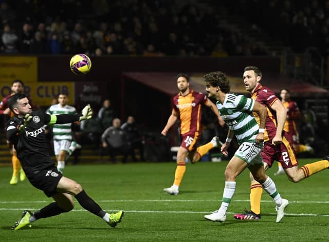 Celtic's Jota scores against Motherwell but the effort was ruled out for offside by VAR. (Photo by Rob Casey / SNS Group)