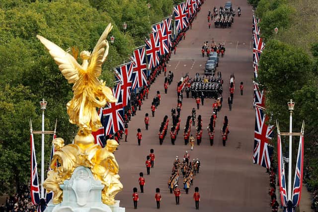 The Queen's funeral cortege borne on the State Gun Carriage of the Royal Navy travels along The Mall and around the Victoria Memorial. Picture: Chip Somodevilla/Getty Images