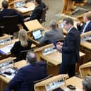 Douglas Ross collects his belongings after being is asked to leave the chamber by the Presiding Officer Alison Johnstone during First Minister's Questions last week  (Picture: Jeff J Mitchell/Getty Images)