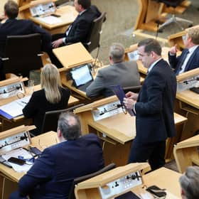 Douglas Ross collects his belongings after being is asked to leave the chamber by the Presiding Officer Alison Johnstone during First Minister's Questions last week  (Picture: Jeff J Mitchell/Getty Images)