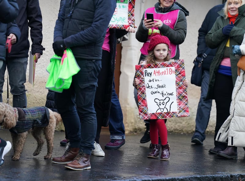 Ella Limardi, 5, joins striking teachers from the EIS to gather on the anniversary of Robert Burns' birth in 1759 outside the cottage in Alloway, Ayrshire, where he was born, as a rolling programme of regional action reaches its halfway point, with teachers in both South Ayrshire and Edinburgh taking strike action in a dispute over pay.