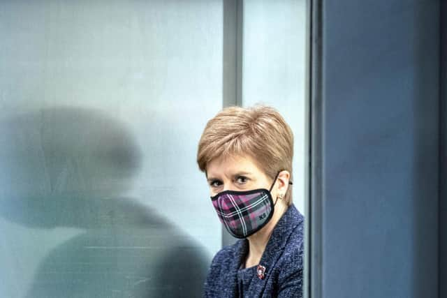 Former first minister Nicola Sturgeon arrives wearing a mask because of the coronavirus pandemic to attend First Minister's Questions at the Scottish Parliament in Holyrood, Edinburgh on October 29, 2020. Picture: Andy Buchanan/POOL/AFP via Getty Images