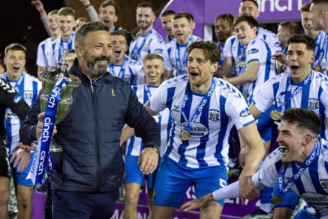 Kilmarnock manager Derek McInnes with the league trophy during a cinch Championship match between Kilmarnock and Arbroath at Rugby Park, on April 22, 2022, in Kilmarnock, Scotland.   (Photo by Ross MacDonald / SNS Group)