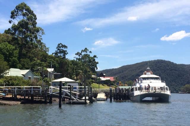 The Riverboat Postman stops along the way to deliver mail to residents along the Hawkesbury River. Pic: riverboatpostman.com.au