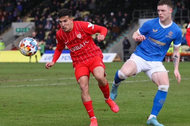 Rangers' Leon King and Sevilla's Fernandez Gomez during a UEFA Youth League match on February 8, 2022. (Photo by Alan Harvey / SNS Group)