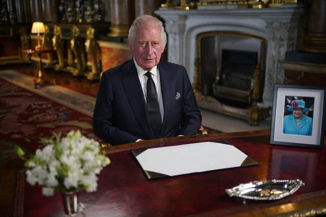 King Charles III delivers his address to the nation and the Commonwealth from Buckingham Palace