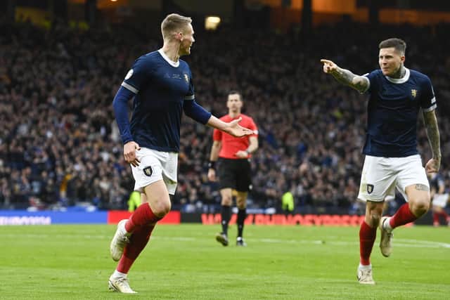 Scott McTominay celebrates making it 2-0 during a UEFA Euro 2024 Qualifier between Scotland and Cyprus at Hampden Park, on March 25, 2023, in Glasgow, Scotland. (Photo by Rob Casey / SNS Group)
