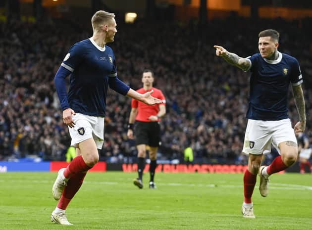 Scott McTominay celebrates making it 2-0 during a UEFA Euro 2024 Qualifier between Scotland and Cyprus at Hampden Park, on March 25, 2023, in Glasgow, Scotland. (Photo by Rob Casey / SNS Group)