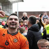 Dundee United's Tony Watt celebrates after fans invade the pitch at full-time following the 1-0 win over Ayr United that has effectively sealed the Championship title.  (Photo by Mark Scates / SNS Group)