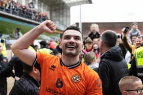 Dundee United's Tony Watt celebrates after fans invade the pitch at full-time following the 1-0 win over Ayr United that has effectively sealed the Championship title.  (Photo by Mark Scates / SNS Group)