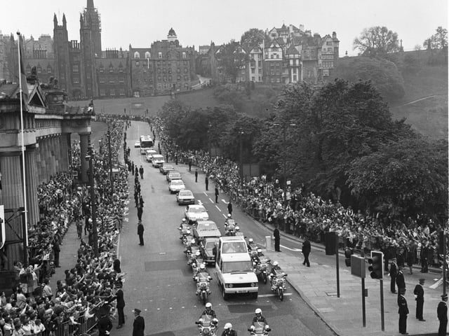 The Popemobile carrying Pope John Paul II makes its way down the Mound from the Assembly Hall in June 1982.