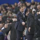 Everton interim manager Duncan Ferguson shakes hands with Aston Villa's head coach Steven Gerrard the English Premier League soccer match between Everton and Aston Villa at the Goodison Park stadium, in Liverpool, England, Saturday Jan. 22, 2022. (AP Photo/Jon Super)