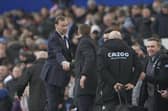 Everton interim manager Duncan Ferguson shakes hands with Aston Villa's head coach Steven Gerrard the English Premier League soccer match between Everton and Aston Villa at the Goodison Park stadium, in Liverpool, England, Saturday Jan. 22, 2022. (AP Photo/Jon Super)