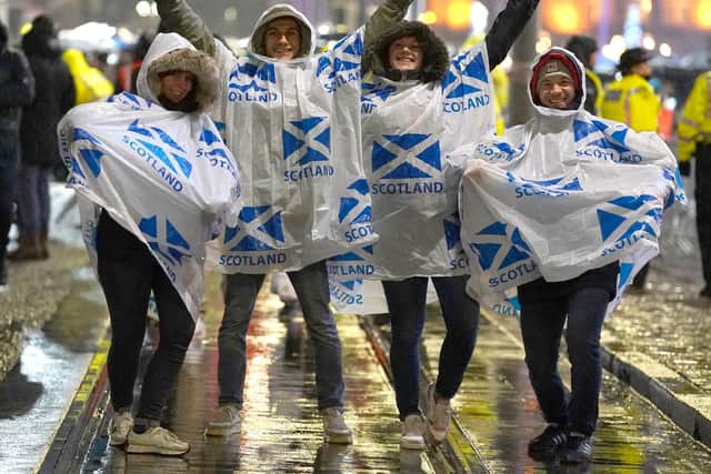 Revellers on Princes Street on Edinburgh as the city's Hogmanay festival returned for the first time since 2019. Picture: Andrew Milligan/PA Wire