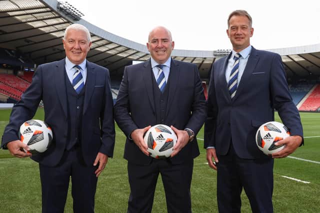 SFA vice president Les Gray, president Mike Mulraney and chief executive officer Ian Maxwell following the association's agm at Hampden yesterday. (Photo by Craig Williamson / SNS Group)
