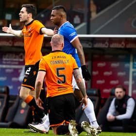 Mark Connolly is grounded, Liam Smith appeals and an angry Micky Mellon looks on after a challenge from Alfredo Morelos in Rangers' 2-1 win over Dundee United at Tannadice  (Photo by Alan Harvey / SNS Group)