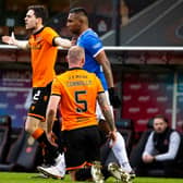 Mark Connolly is grounded, Liam Smith appeals and an angry Micky Mellon looks on after a challenge from Alfredo Morelos in Rangers' 2-1 win over Dundee United at Tannadice  (Photo by Alan Harvey / SNS Group)