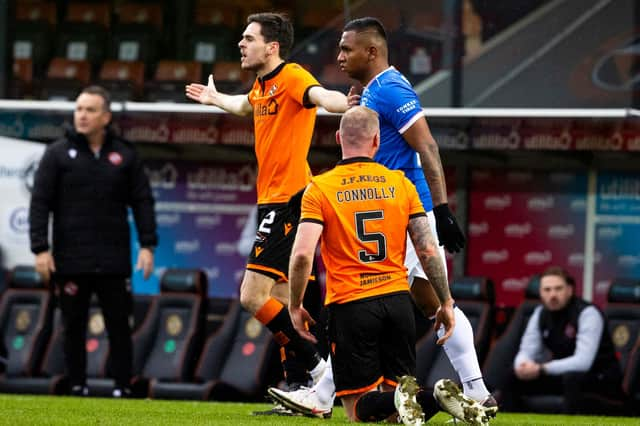 Mark Connolly is grounded, Liam Smith appeals and an angry Micky Mellon looks on after a challenge from Alfredo Morelos in Rangers' 2-1 win over Dundee United at Tannadice  (Photo by Alan Harvey / SNS Group)