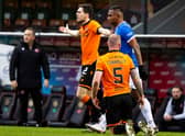 Mark Connolly is grounded, Liam Smith appeals and an angry Micky Mellon looks on after a challenge from Alfredo Morelos in Rangers' 2-1 win over Dundee United at Tannadice  (Photo by Alan Harvey / SNS Group)