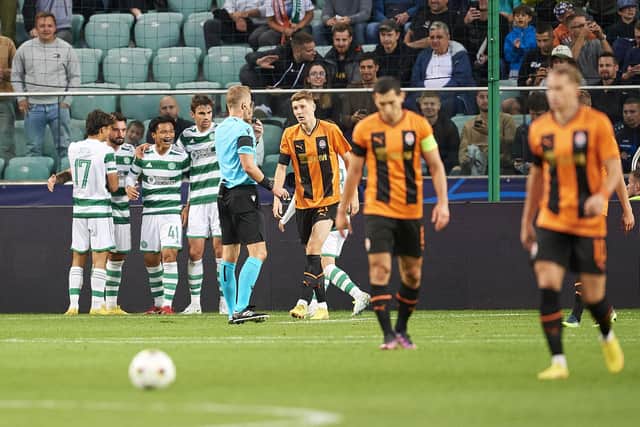 Reo Hatate celebrates his Celtic opener with teammates in the 1-1 draw with Shakhtar Donetsk in Warsaw. (Photo by Adam Nurkiewicz/Getty Images)
