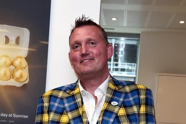 Doddie Weir in his famous tartan suit.