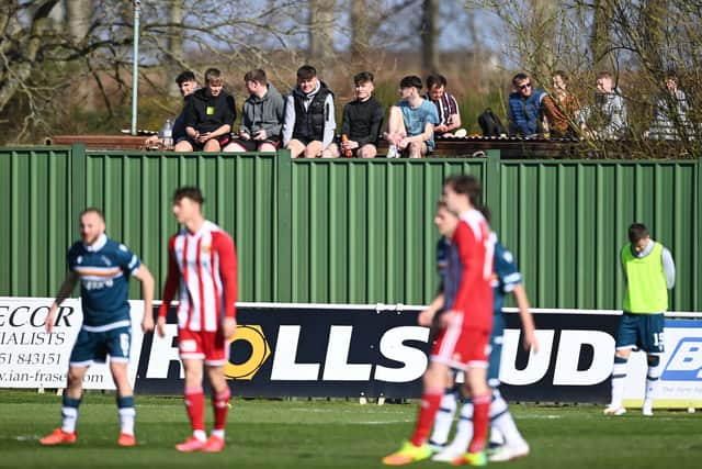 Fans watch on during the Scottish Cup Third Round tie between Formartine United and Motherwell at North Lodge Park