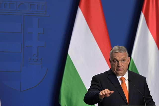Hungarian Prime Minister Viktor Orban gives his first international press conference after his FIDESZ party won the parliamentary election with a pledge to continue his "illiberal" revolution. (Photo by ATTILA KISBENEDEK/AFP via Getty Images).