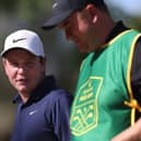 Bob MacIntyre speaks with his caddie, Mike Burrow, during the pro-am prior to the DP World Tour Championship on the Earth Course at Jumeirah Golf Estates in Dubai. Picture: Oisin Keniry/Getty Images.