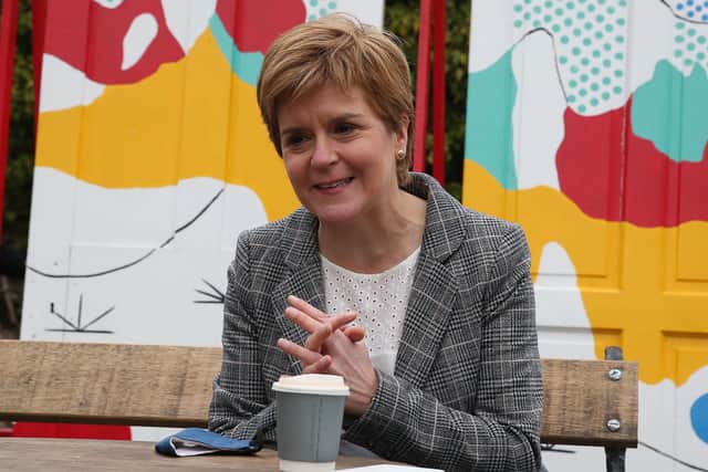 First Minister Nicola Sturgeon has a coffee during a visit to  North Berwick, on the campaign trail for the Scottish Parliamentary election.