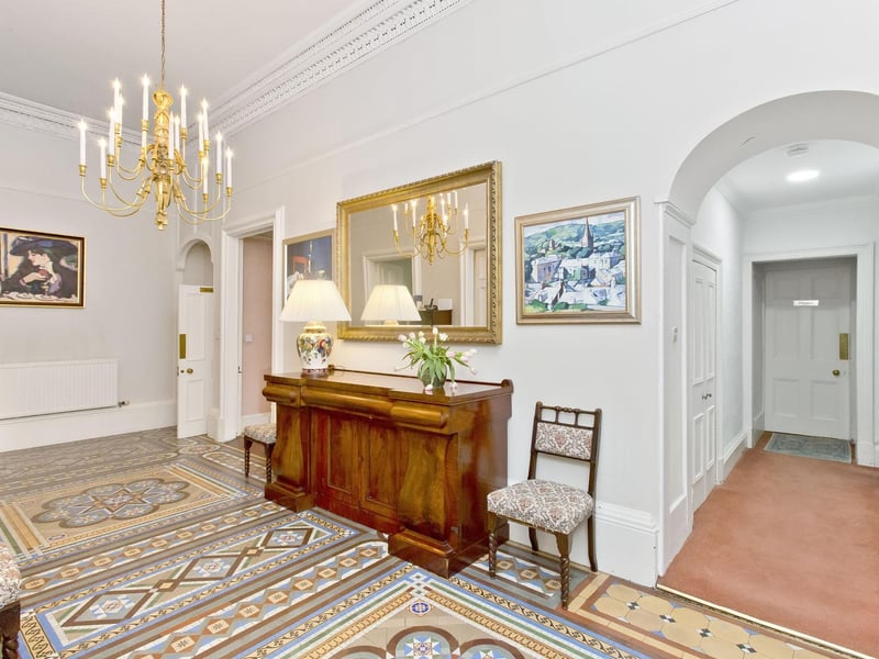 The reception hall instantly impresses and leads to all ground-floor rooms