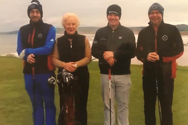 Belle Robertson and Bob MacIntyre flanked by David Graham, left, and Willie Ross, during a game at Machrihanish before Covid-19 restrictions were introduced