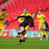 Harrogate Town's Josh McPake (right), on loan from Rangers, in action during the Buildbase FA Trophy 2019/20 Final at Wembley Stadium