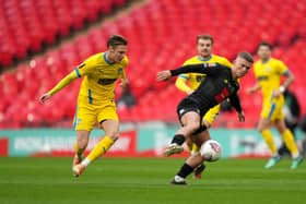 Harrogate Town's Josh McPake (right), on loan from Rangers, in action during the Buildbase FA Trophy 2019/20 Final at Wembley Stadium