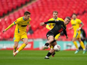 Harrogate Town's Josh McPake (right), on loan from Rangers, in action during the Buildbase FA Trophy 2019/20 Final at Wembley Stadium