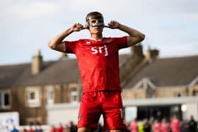 Dunfermline's Matthew Todd celebrates after scoring the winning penalty against Raith Rovers. (Photo by Craig Williamson / SNS Group)