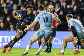 Edinburgh's Viliame Mata, left, on the attack in the 19-14 win over Glasgow Warriors in the BKT United Rugby Championship match at Murrayfield Stadium, on December 30, 2023. (Photo by Ross Parker / SNS Group)