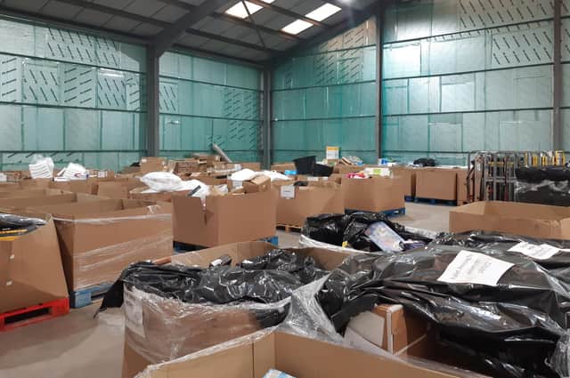 Some of the boxes of goods from Amazon being distributed  by the Cottage Centre to families in need across Fife