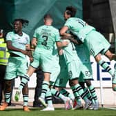 Hibs celebrate the winning goal against St Johnstone at McDiarmid Park.