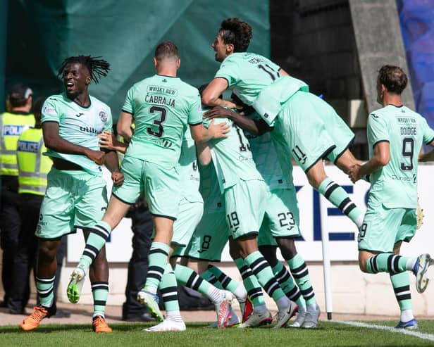 Hibs celebrate the winning goal against St Johnstone at McDiarmid Park.