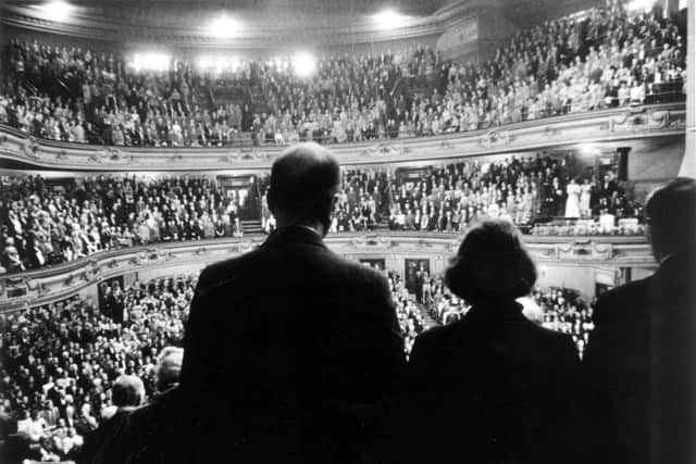 The audience stands for the National Anthem at the opening of the first Edinburgh International Festival at the Usher Hall in 1947