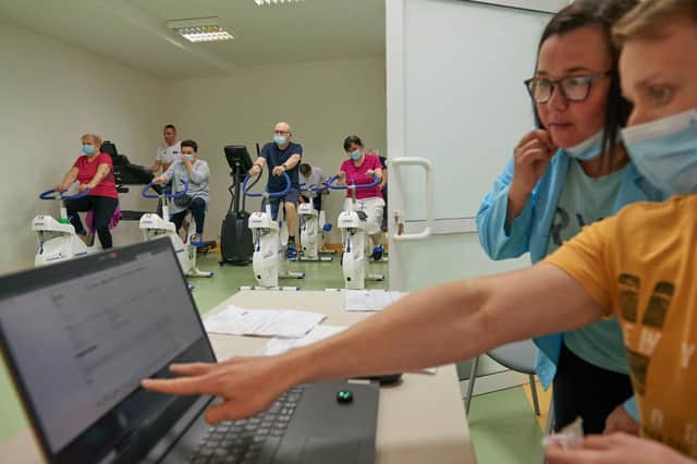 Health workers in Poland are developing physical rehabilitation programmes to help long Covid patients, with virtual reality games used to test their reaction skills (Picture: Bartosz Siedlik/AFP via Getty Images)