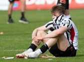 Coll Donaldson is dejected at full-time as Dunfermline are relegated to League One. (Photo by Sammy Turner / SNS Group)