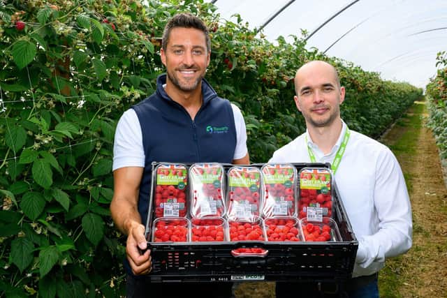 17.6 million Scottish raspberries heading to Asda shelves. Pictured is Liam Stewart, Managing Director at Stewarts of Tayside with Adrian Okolski, General Store Manager at Asda Perth