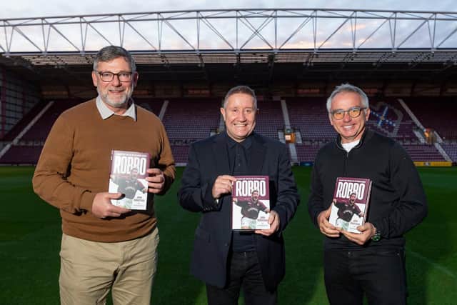John Robertson (centre) is joined by former Hearts teammates Craig Levein (left) and John Colquhoun at the launch of his autobiography at Tynecastle (Photo by Mark Scates / SNS Group)