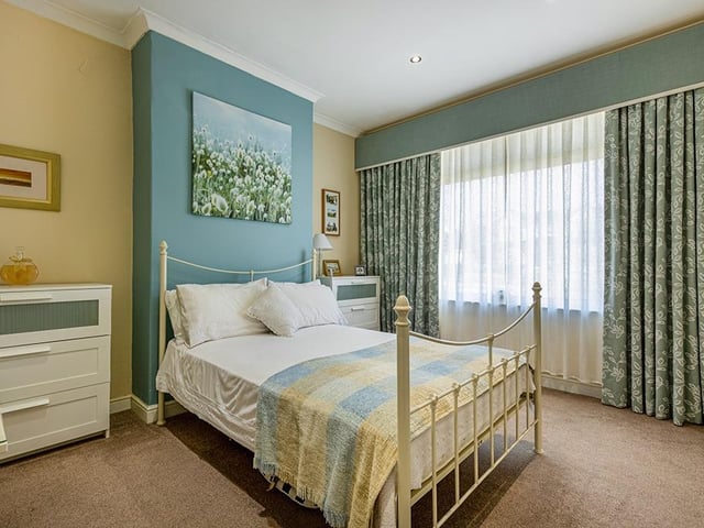 Exterior: A gated driveway provides ample parking and there are well-maintained gardens front and rear.
Contact: Rettie & Co.