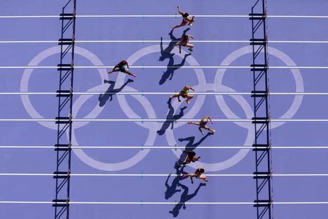 An aerial view of athletes competing during the Women's Heptathlon 100m Hurdles at the Olympics in Paris. The Games have been just one highlight in a fantastic summer of sport (Picture: Richard Heathcote/Getty Images)