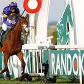 Corach Rambler, ridden by Derek Fox, winning Saturday's Grand National at Merseyside's Aintree Racecourse (Photo by Michael Steele/Getty Images)